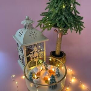 miasto otulone zimą Świeca w szkle